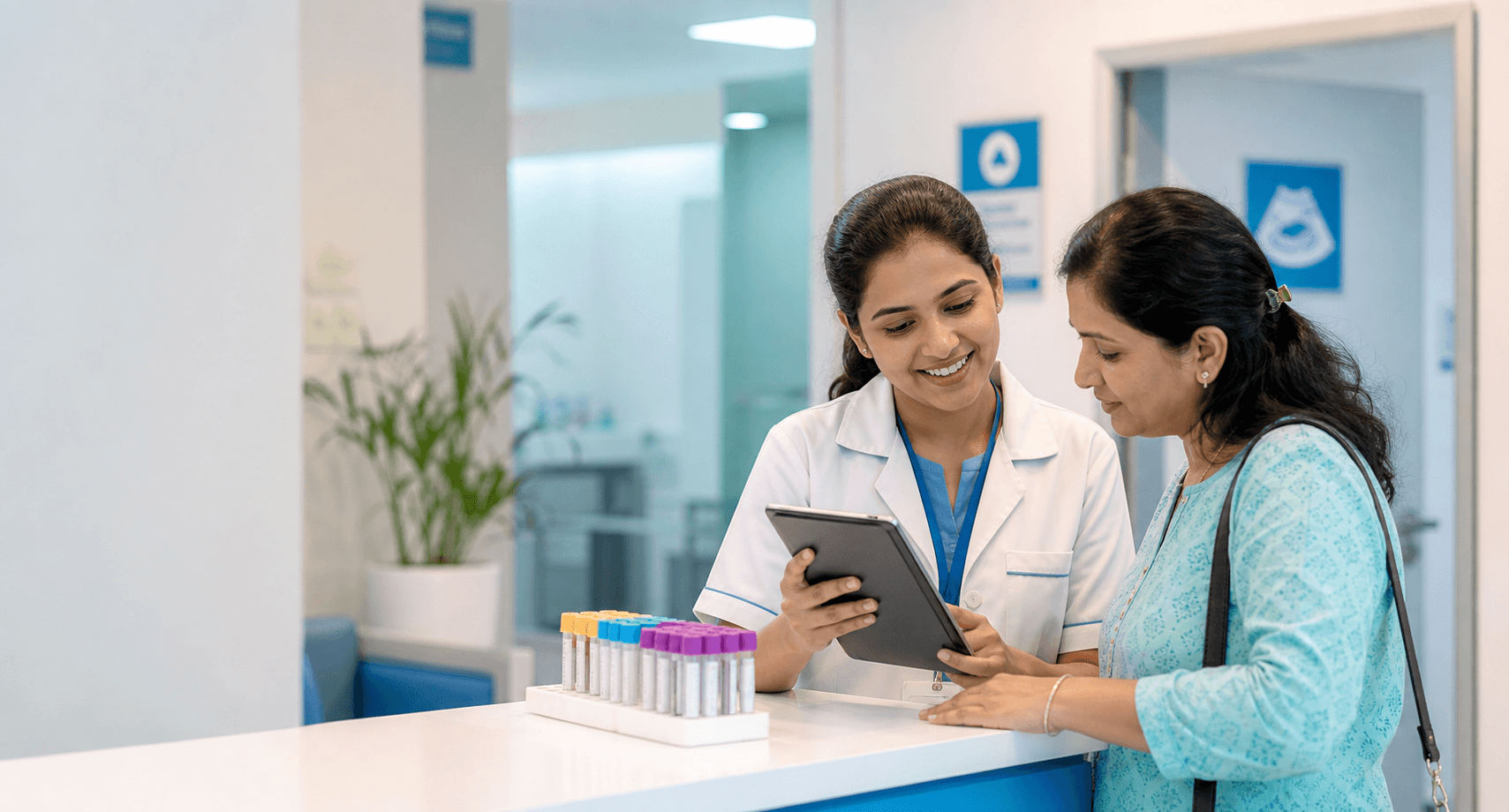 Diagnostic centre team assisting a patient at the reception desk